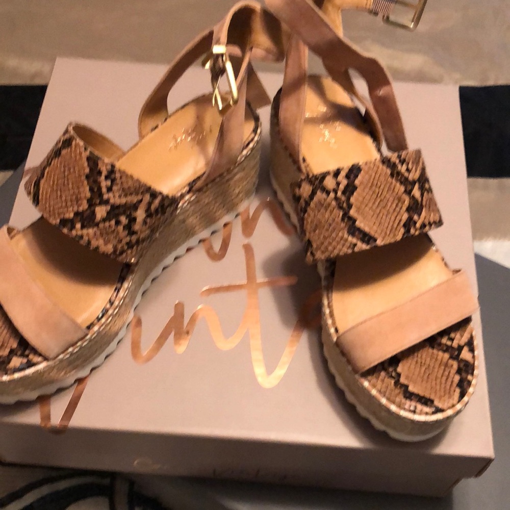 Tan and leopard sandals around the ankle strap very comfortable
